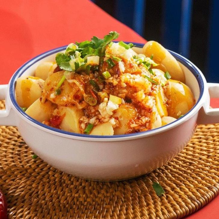 Chili potato bowl topped with scallions and cilantro